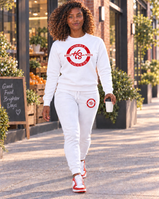 Persona 4 wearing the Humble Success white sweatsuit with red logo